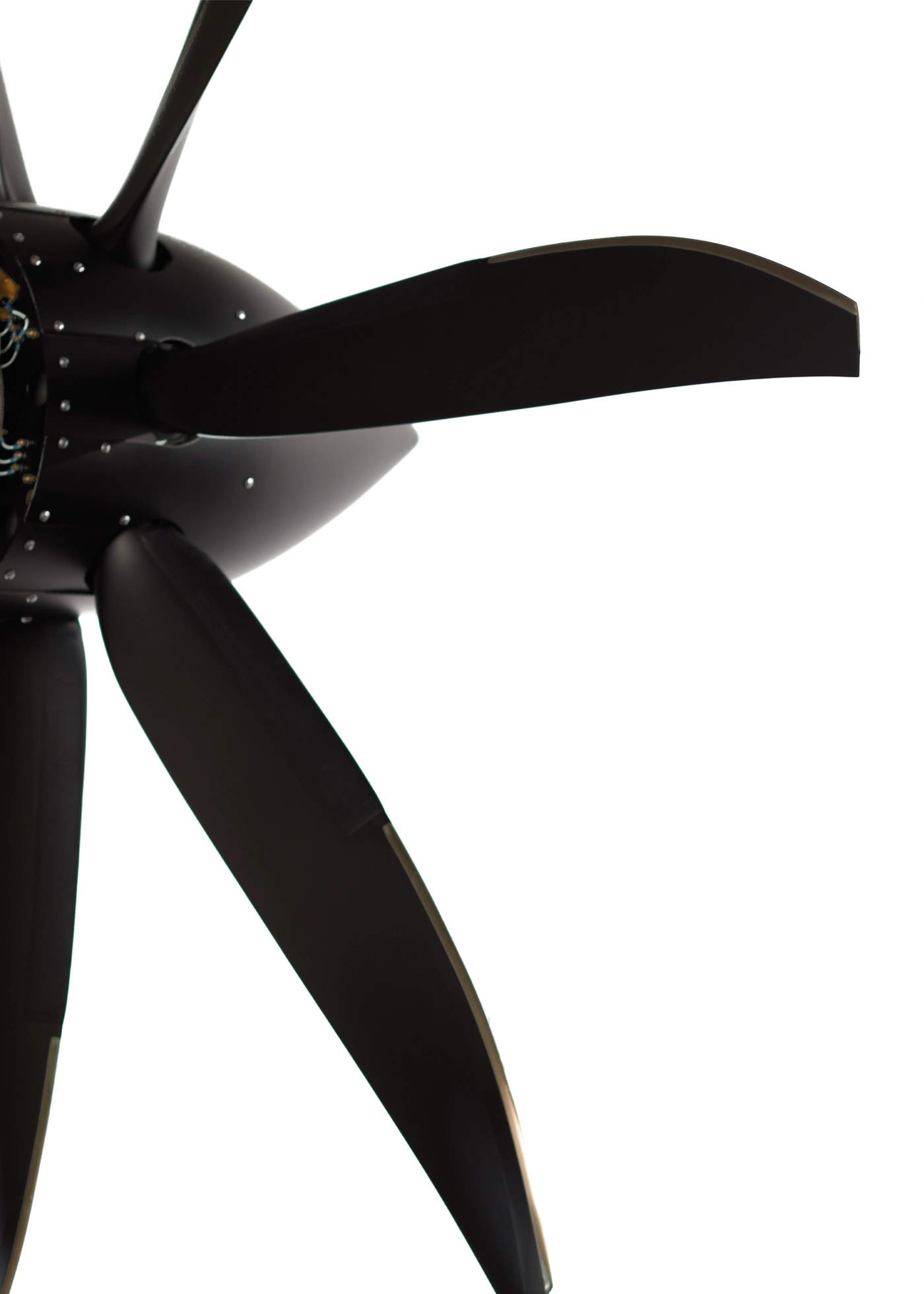 Black blades and spinner of an MT seven-blade propeller against white